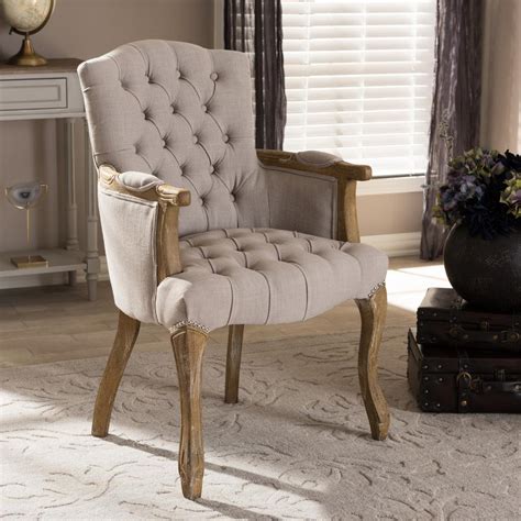 Dining chairs don't just have to look good, but should feel good, too. Baxton Studio Clemence Beige Fabric Upholstered Dining Arm ...