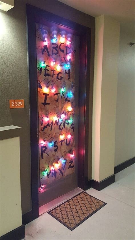 A Door Decorated With Christmas Lights And Letters