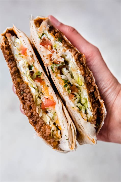 I'm pretty sure the people at taco bell saw me and started making a crunchwrap supreme with no meat, substitute refried beans from a mile away. Homemade Crunchwrap Supreme Recipe | Little Spice Jar