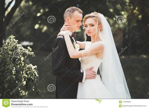 Lovely Happy Wedding Couple Bride With Long White Dress