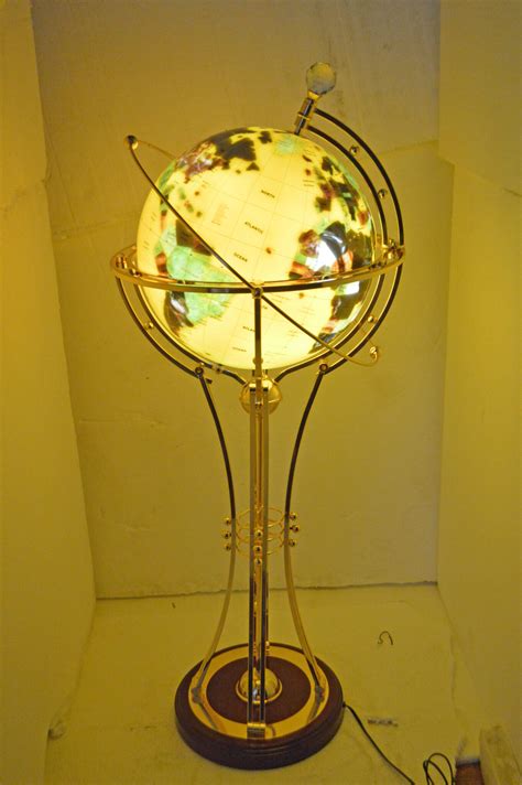 Illuminated Yellow Gold World Globe Rotated By A Motor Size 19 X 19