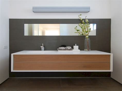 Swapping a pedestal basin for a vanity unit will give you handy extra countertop space and, if you go for one with storage underneath, you'll have somewhere to stash your toiletries and cleaning kit, too. Best Modern Bathroom Ideas - Floating Wooden Vanity ...