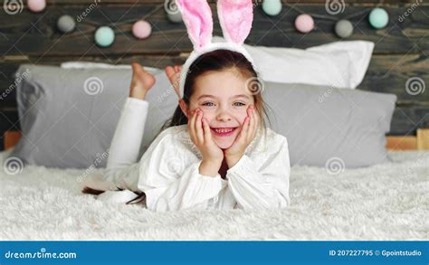 Smiling Girl With Bunny Ears Lying On The Bed Stock Video Video Of