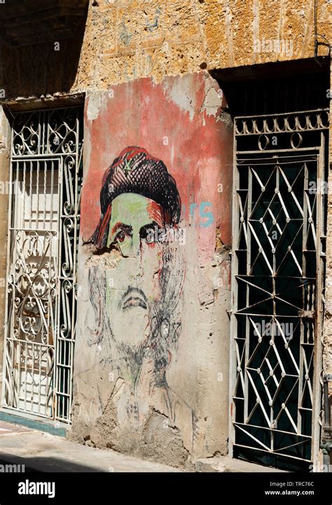 Mural Of Che Guevara Painted On Dilapidated Wall Of Building In Old