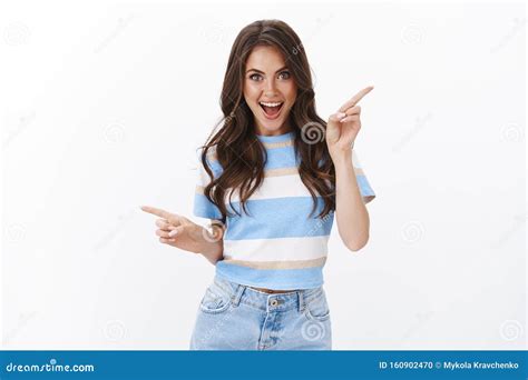 Sassy Flirty Enthusiastic Brunette Woman Checking Out Awesome Promo Pointing Sideways