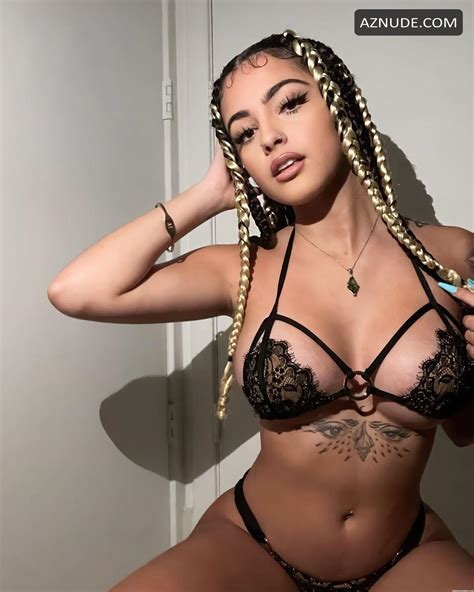Malu Trevejo Sexy Shows Tits As She Poses In Lace Lingerie In A