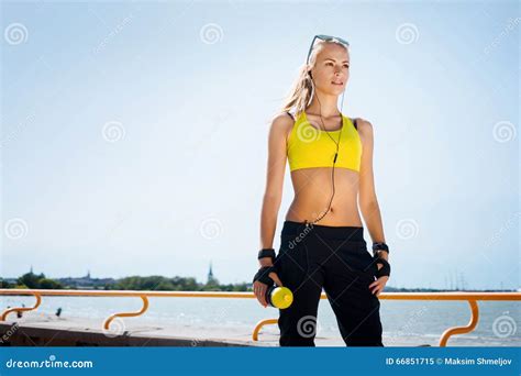 Young Beautiful Sporty And Fit Girl Rollerblading On Inline Skates