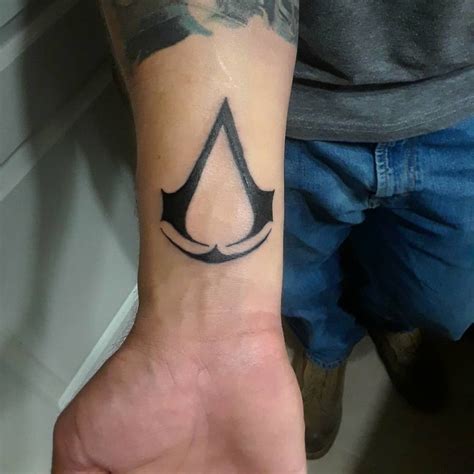 101 Amazing Assassins Creed Tattoo Designs You Need To See