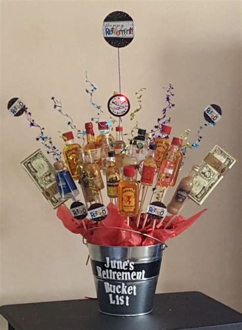 71 best retirement gifts for men. Booze bouquet retirement gift for my mother in law. It was da bomb. | Retirement party gifts ...