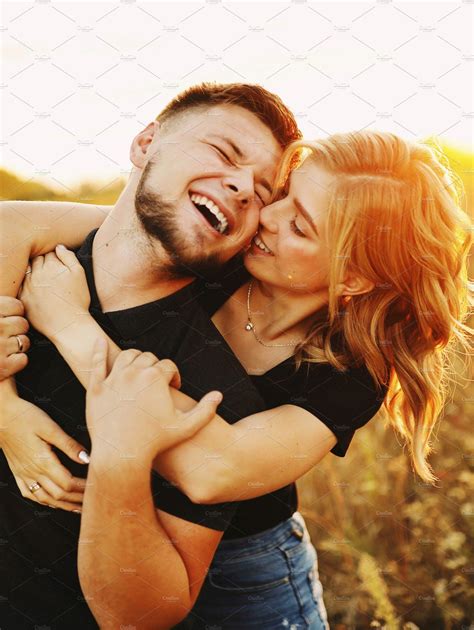 Lovely Smiling Couple On Sunset Couples Photo Hugging Couple