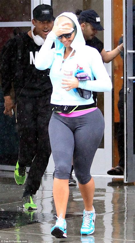 amber rose squeezes her curves into skintight gym gear daily mail online