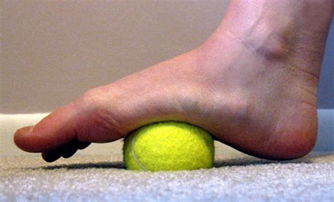 Massage Your Feet With A Tennis Ball Popsugar Fitness