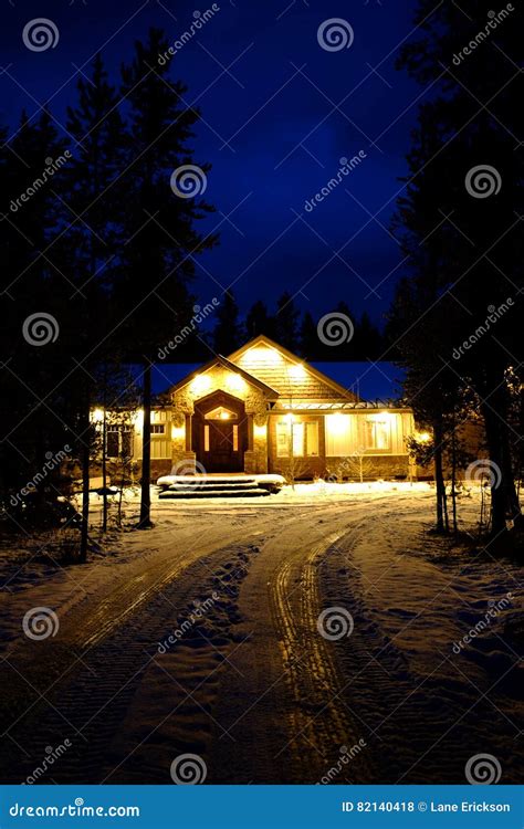 Winter Cabin Glowing Warm At Night Blue Sky Stock Photo Image Of
