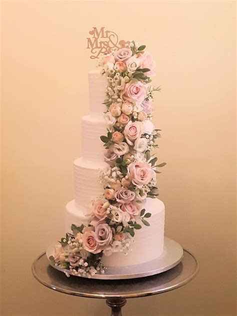 Buttercream Ridges Cake With Fresh Flower Cascade In Pink Lilac And