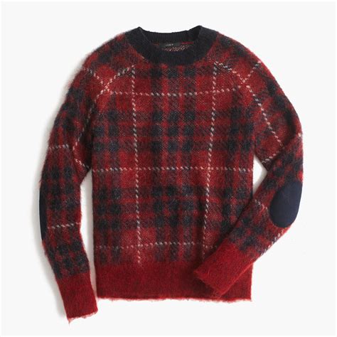 this pretty plaid sweater gets a cool update thanks to a fuzzy wool blend and contrast trim