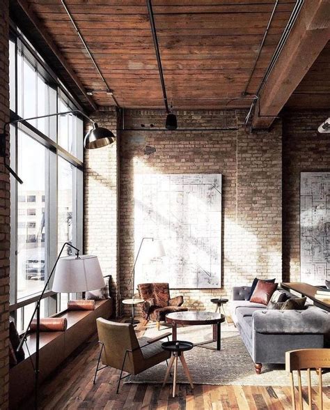 A Living Room Filled With Lots Of Furniture Next To Large Windows On