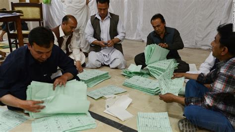 despite violence pakistanis vote in landmark election cnn