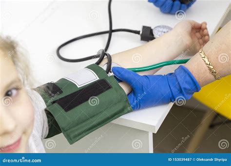 Measuring The Pressure Of A Child With A Tonometer Stock Image Image
