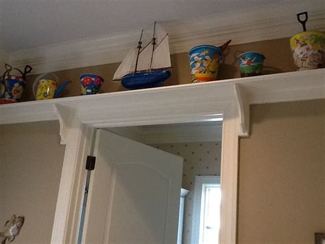 Shelf Installed Above The Doors And Down The Back Hallway Holds Sand
