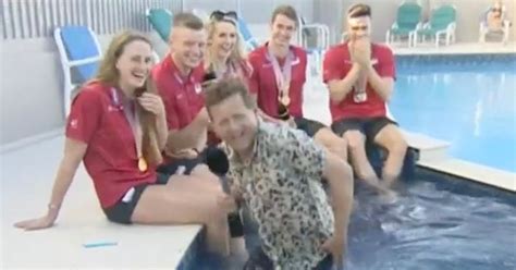 Bbc Presenter Falls Into Pool During Interview Leaving Commonwealth