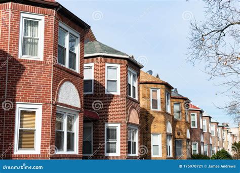 Row Of Similar Old Brick Homes In Astoria Queens New York Stock Image