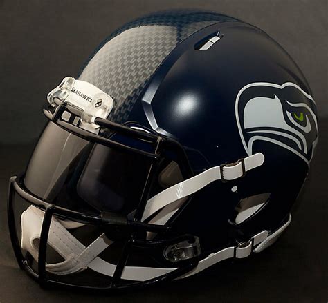The evolution of the seahawks helmet features a bigger, bolder seahawks logo, a switch from pacific blue to a. SEATTLE SEAHAWKS NFL Authentic GAMEDAY Football Helmet w ...