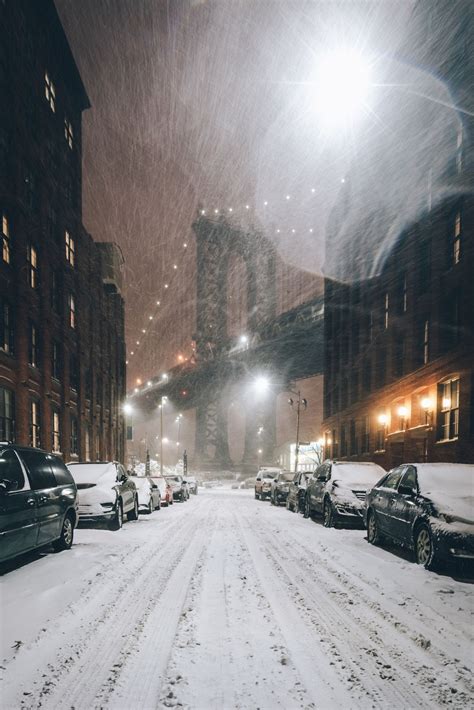 Dark And Stormy View On The Manhattan Bridge During The Snowstorm