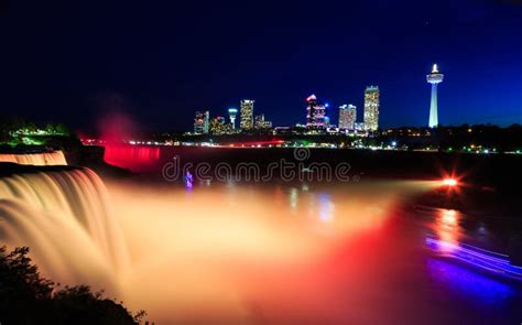 Niagara Falls Illuminated At Night With Multicolored Lights Stock Photo