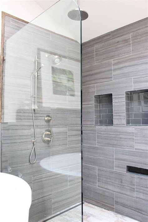 12x24 tiles all the way to the ceiling with minimal grout lines via design indulgence before