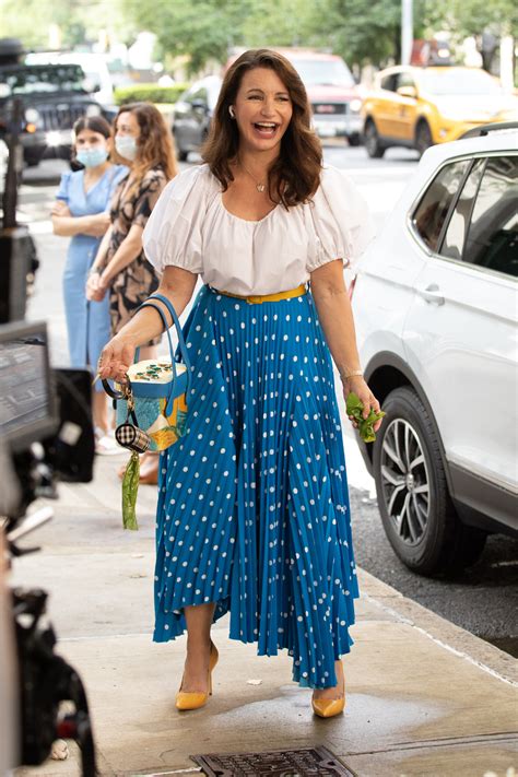 kristin davis surprises in slides skirt and blouse for ‘sex and the city footwear news