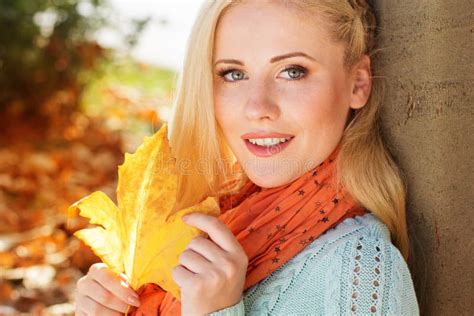 Pretty Girl Is Sitting In Autumn Park With Maple Stock Image Image Of