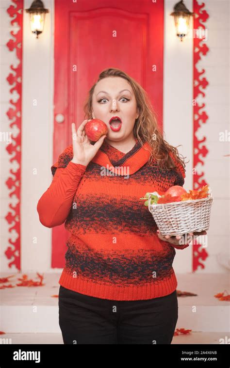Beautiful Caucasian Emotional Chubby Woman With Apples In Small Basket