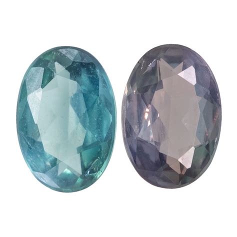 Two Blue And Green Gems Are Shown Side By Side On A White Background