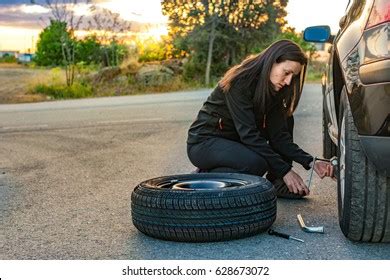 Woman Trouble Trying Change Wheel Stock Photo Shutterstock