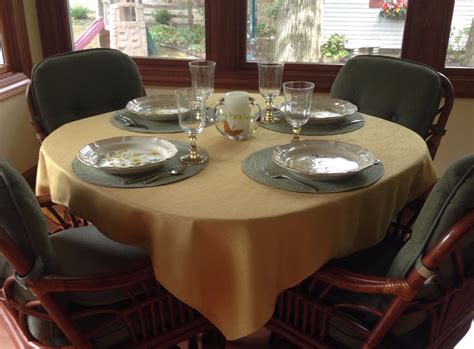 Surface embossing is an elegant floral design. Dining Table Top Extension Pad - Table Top Extender