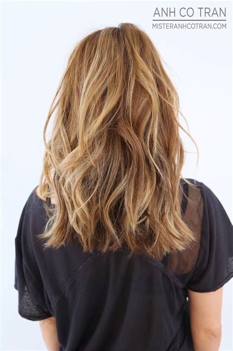 They both provide layering options, which is great for wavy hair. Choppy layered haircut inspiration | Long wavy haircuts ...