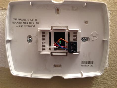 You can either run that wire separately from the system control panel to the thermostat or, preferably, run a new cable that includes all the wires you need. Can we use a Honeywell programmable thermostat on Trane XE 80? The wiring looks very different.