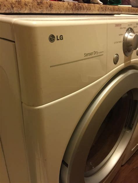 The lint on the roof below the vent opening may not itself be a problem but its presence made us worry that because this vent opening is difficult to access the system could easily become clogged with lint. Accessing dryer vent