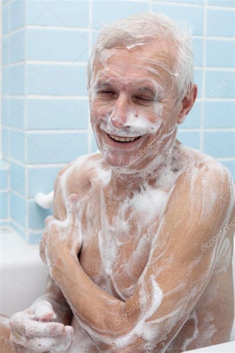 Happy Senior Man Bathing Stock Photo By Janmika