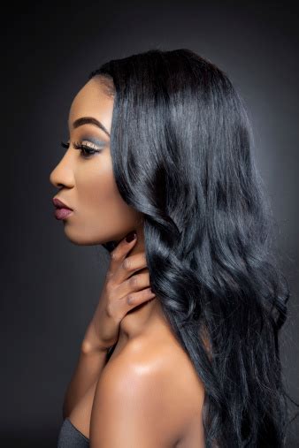 Black Beauty With Elegant Curly Hair Stock Photo Download Image Now
