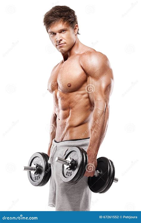 Muscular Bodybuilder Guy Doing Exercises With Dumbbells Stock Photo