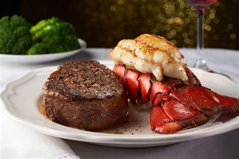 My tastes are fairly simple…. Steak And Lobster On A White Plate And Table Cloth Stock ...