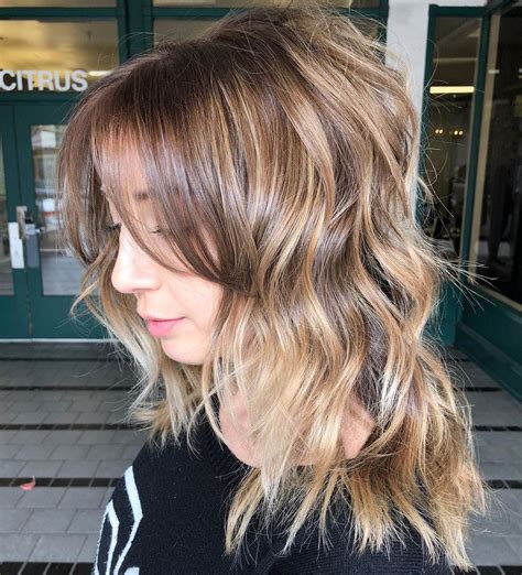 25 Must Try Medium Length Layered Haircuts For 2022