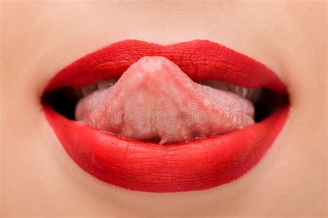 View Of Girl With Red Lipstick Licking Lips On White Stock Photo