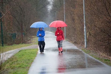 Couple Walking In The Rain Stock Photo Image Of Rain 53932470
