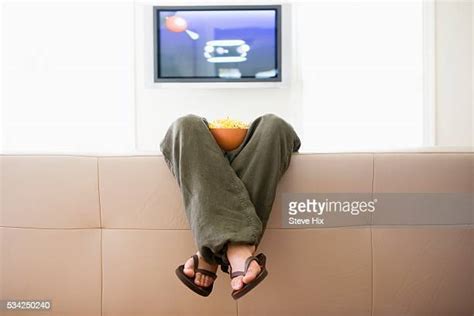 Man Feet Up Watching Tv Photos Et Images De Collection Getty Images