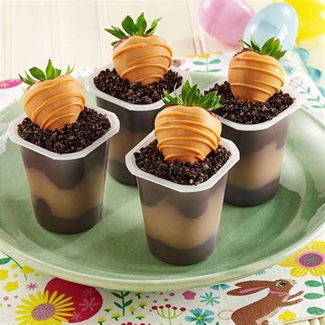 Create an adorable easter egg hunt scene with this layered pudding dessert. Carrot in Dirt Dessert Pudding Cups | Recipe | Dirt ...
