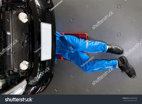 Mechanic Blue Uniform Lying Down Working Stock Photo 404090668