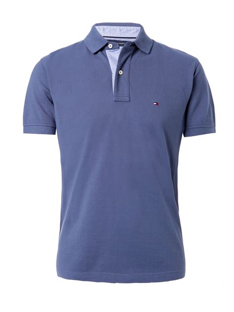 Smarten it up with a pair of straight leg trousers or keep it casual with a pair of jeans and classic trainers. Tommy Hilfiger Classic Tommy Polo Shirt in Blue for Men ...