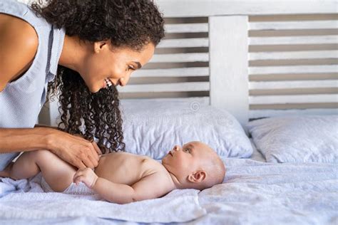 Mother Changing Baby Diaper Stock Photo Image Of Newborn Black